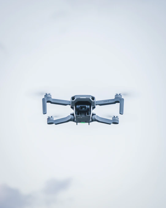 black and gray camera on white surface