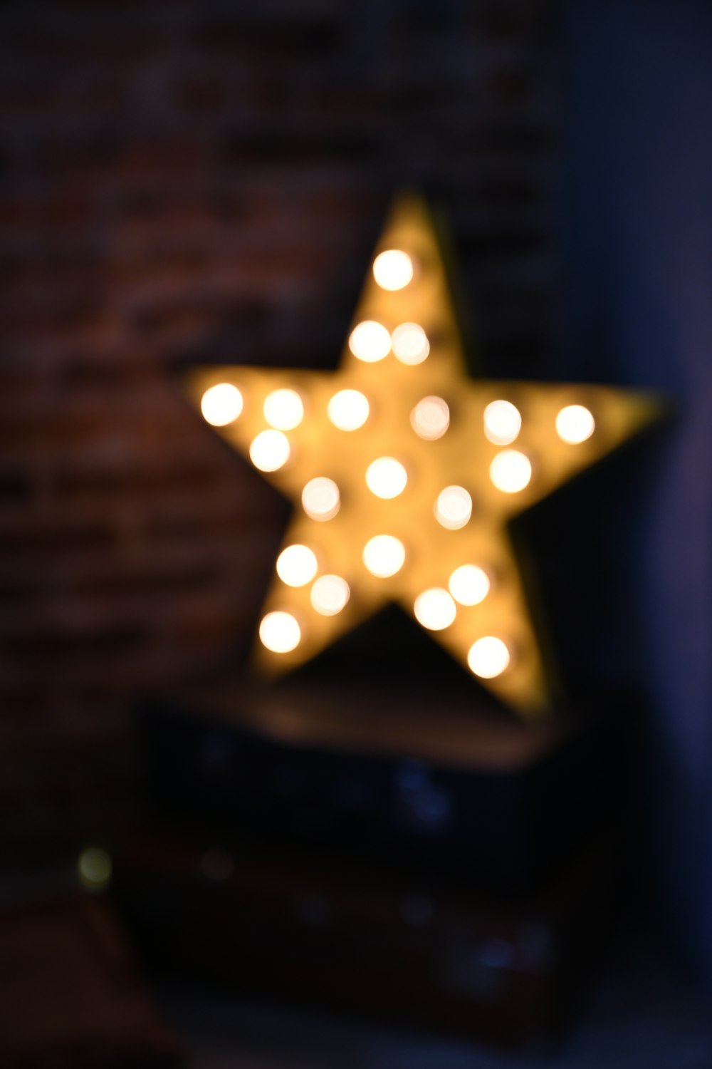 gold star ornament on brown wooden table