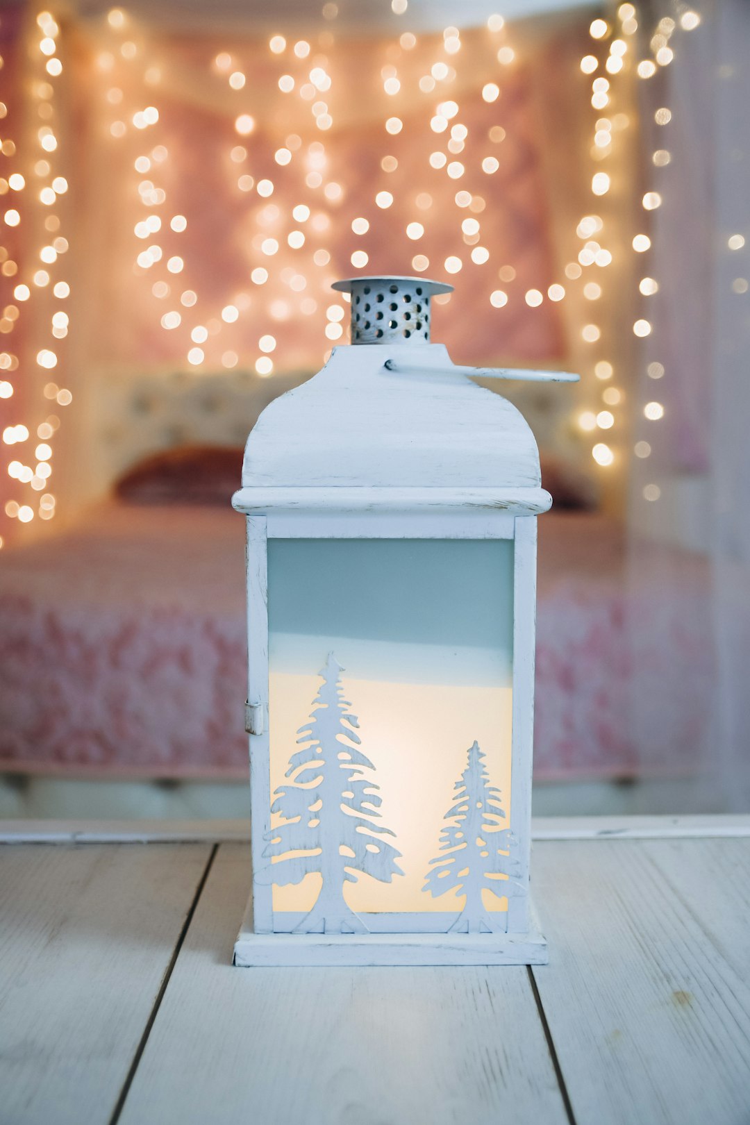white and black floral candle lantern