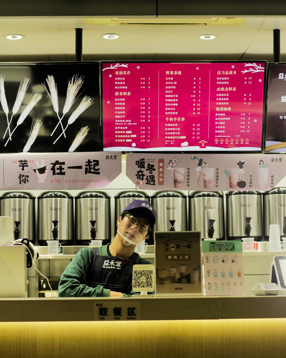 Man in black and white nike jacket standing near counter photo – Free  Shenzhen Image on Unsplash