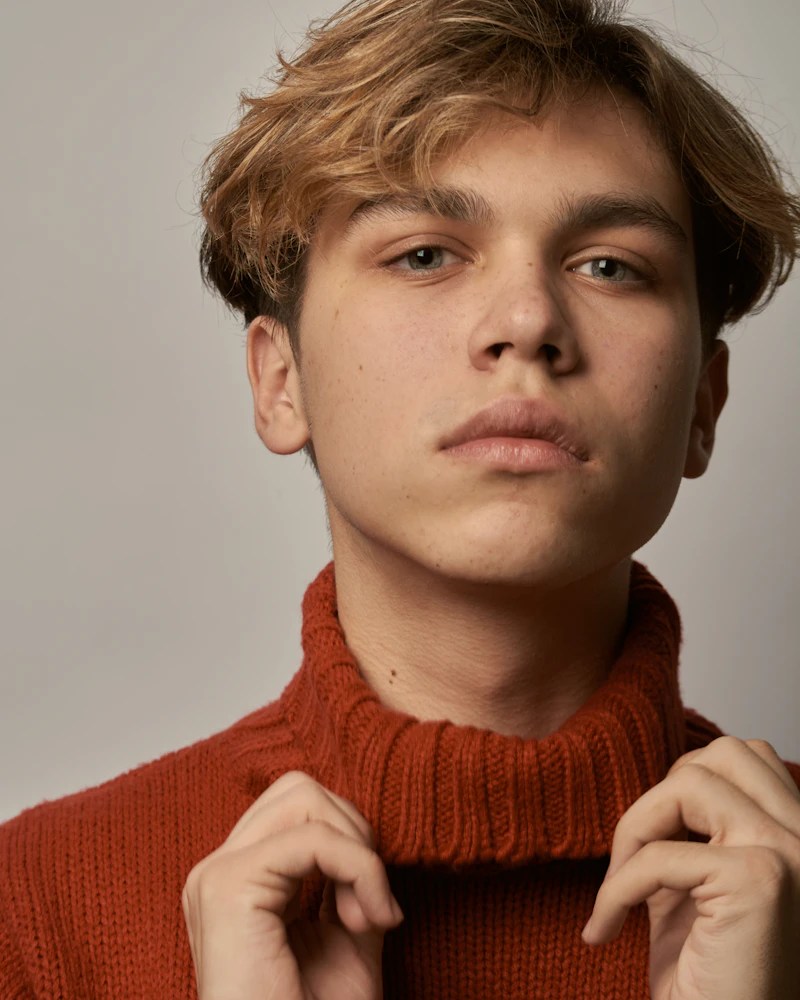 Man in a red knit sweater