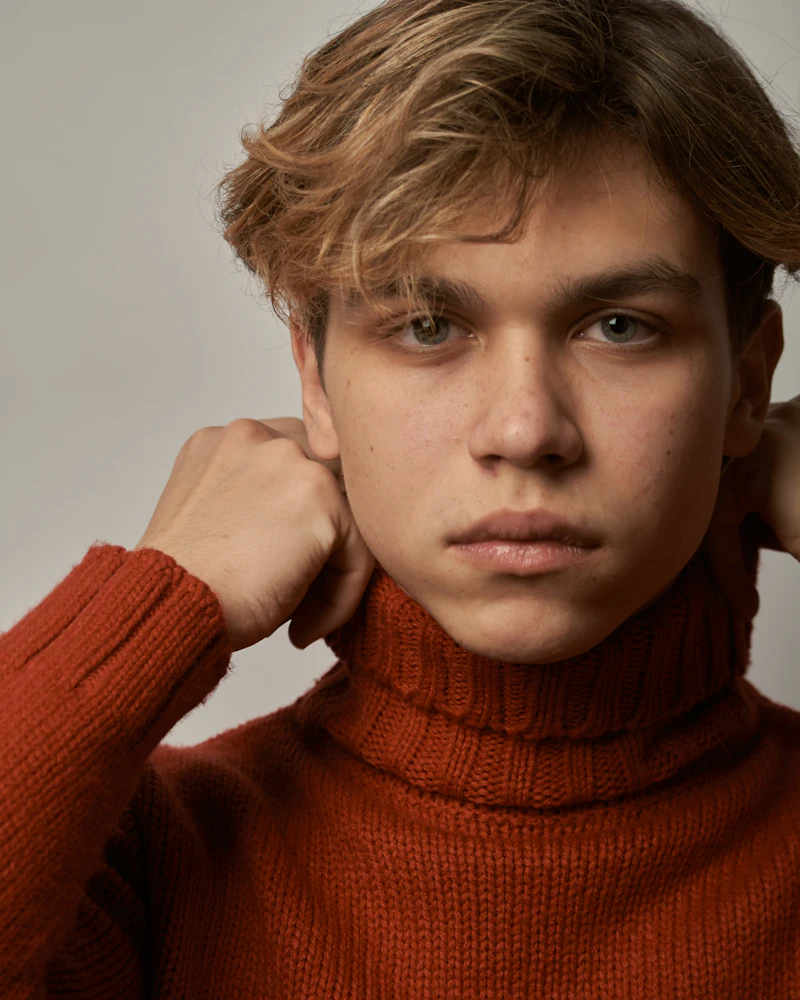 Woman in a red turtleneck sweater