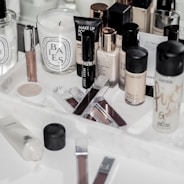 assorted make up brushes on white table