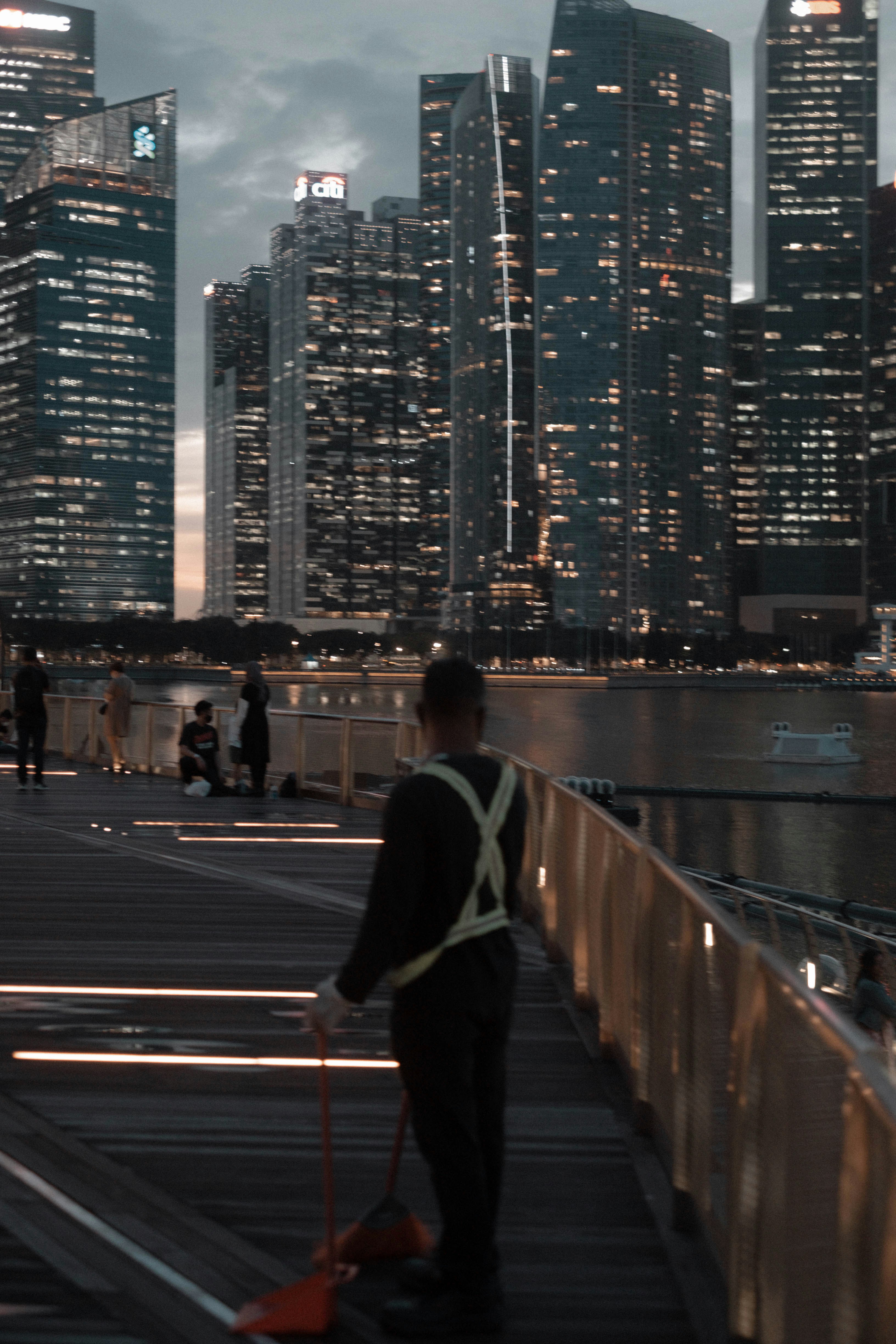 Man In Black Jacket Walking On Sidewalk During Daytime Photo Free Grey Image On Unsplash