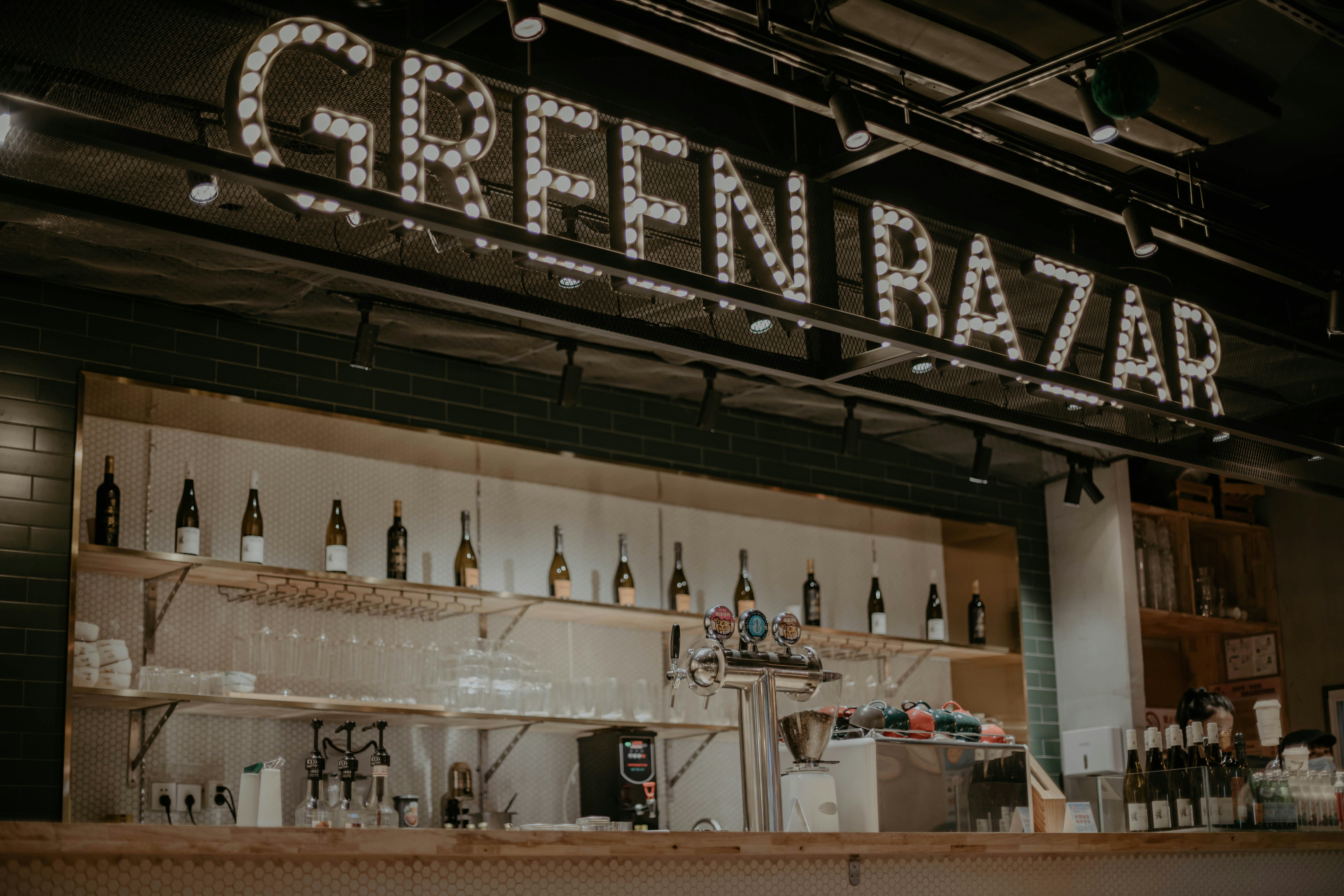 people sitting on bench near brown wooden table