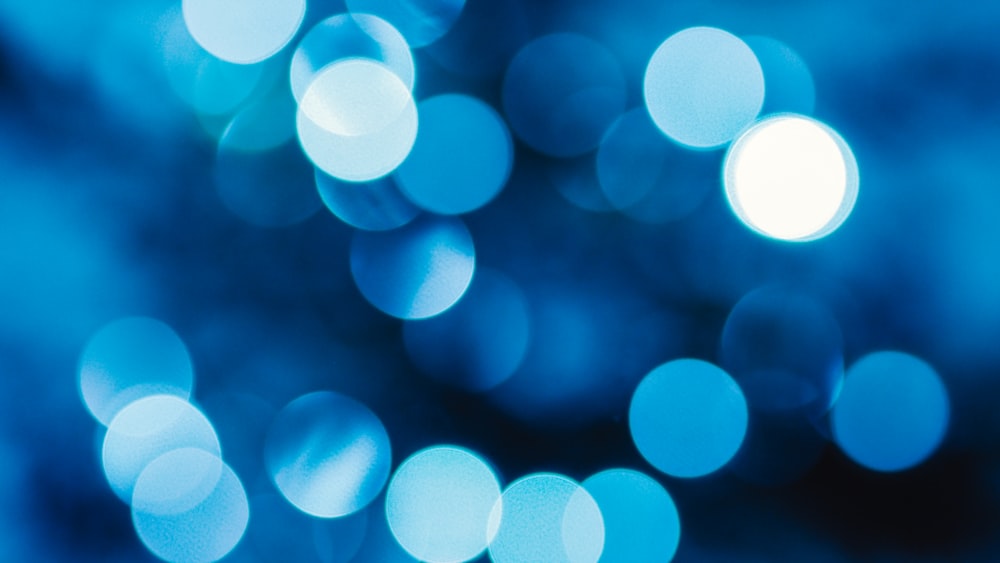 blue and white bokeh lights