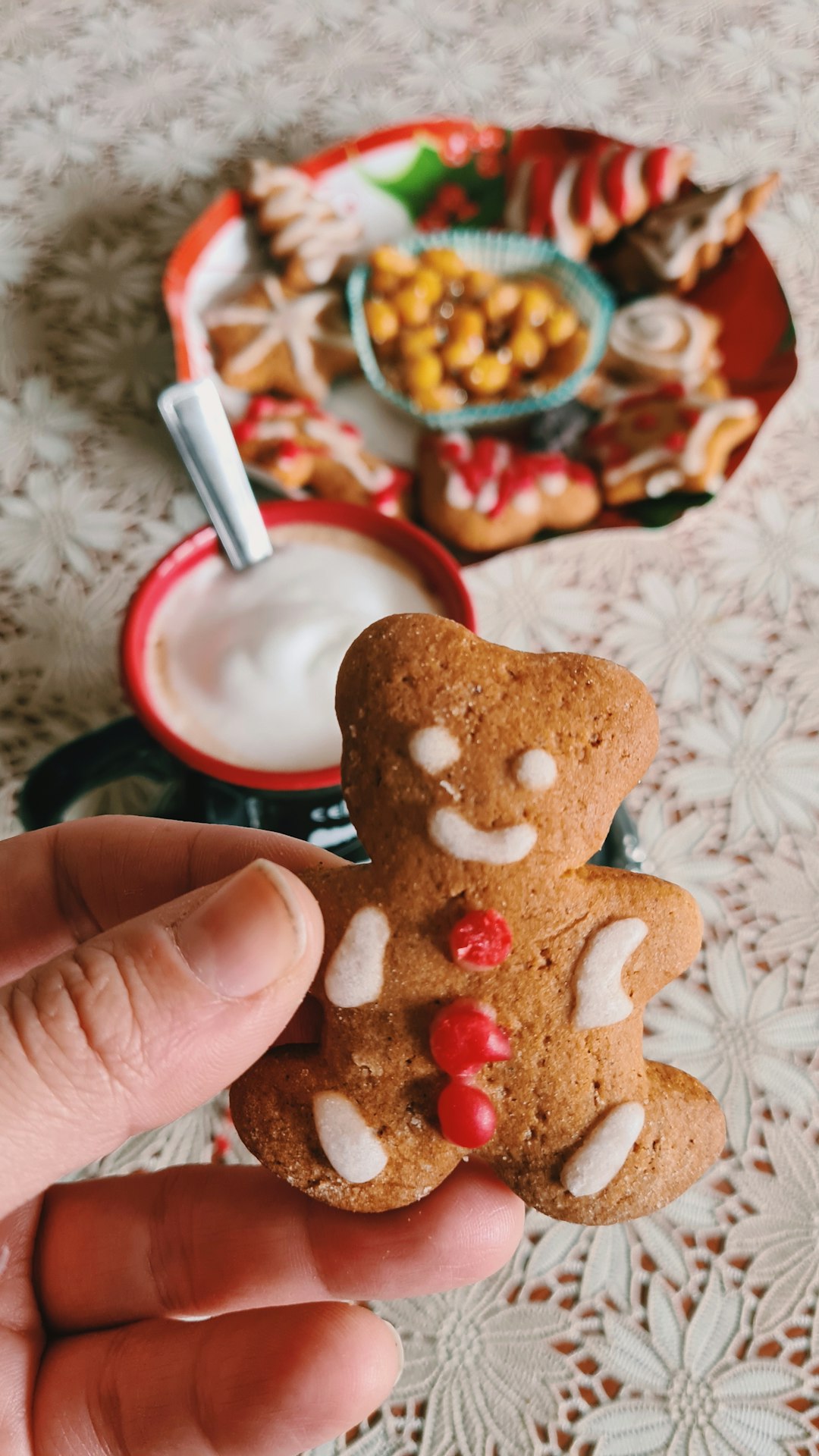 person holding heart shaped bread