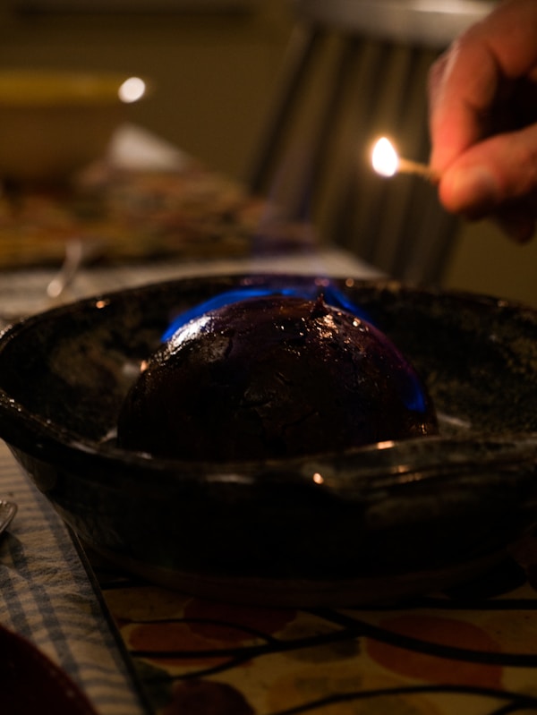 Chocolate cake on black ceramic plate