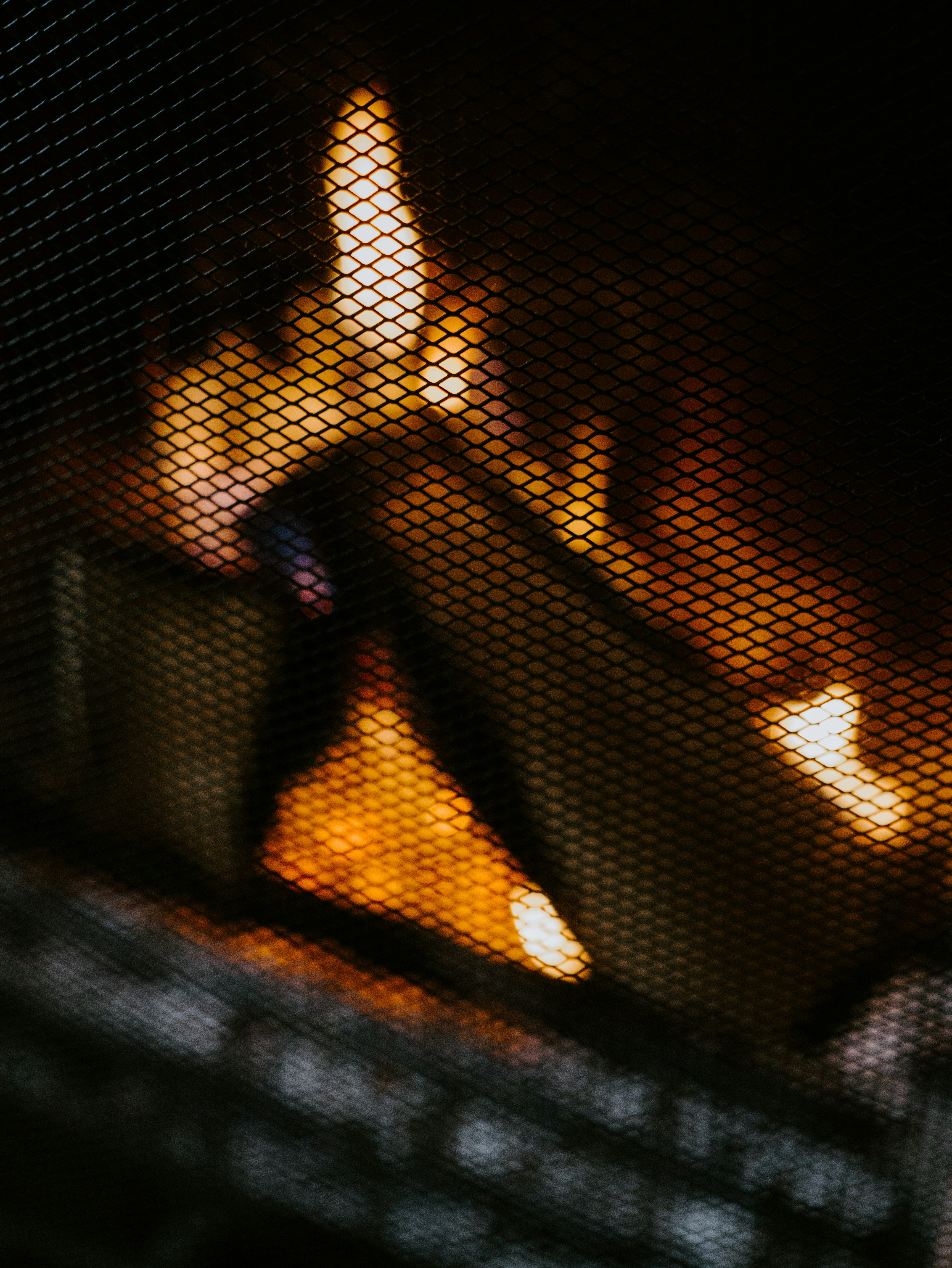brown wood in black metal fireplace