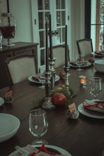 Close-up of elegant table settings with personalized name cards and candles.