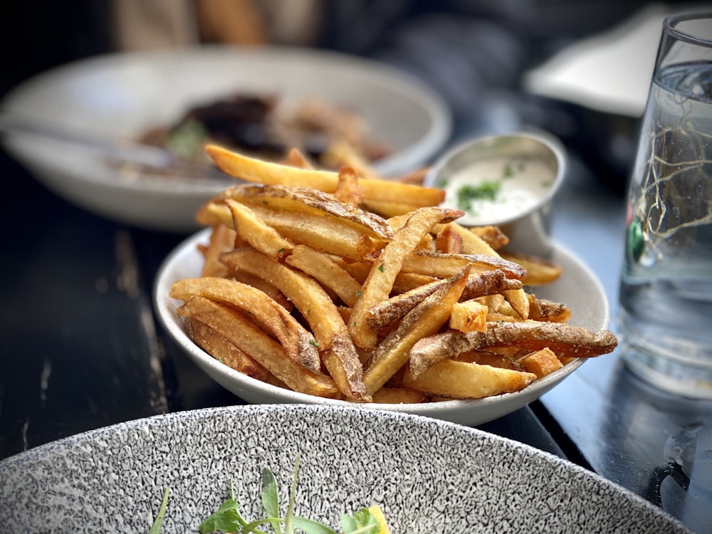 fries on white ceramic plate