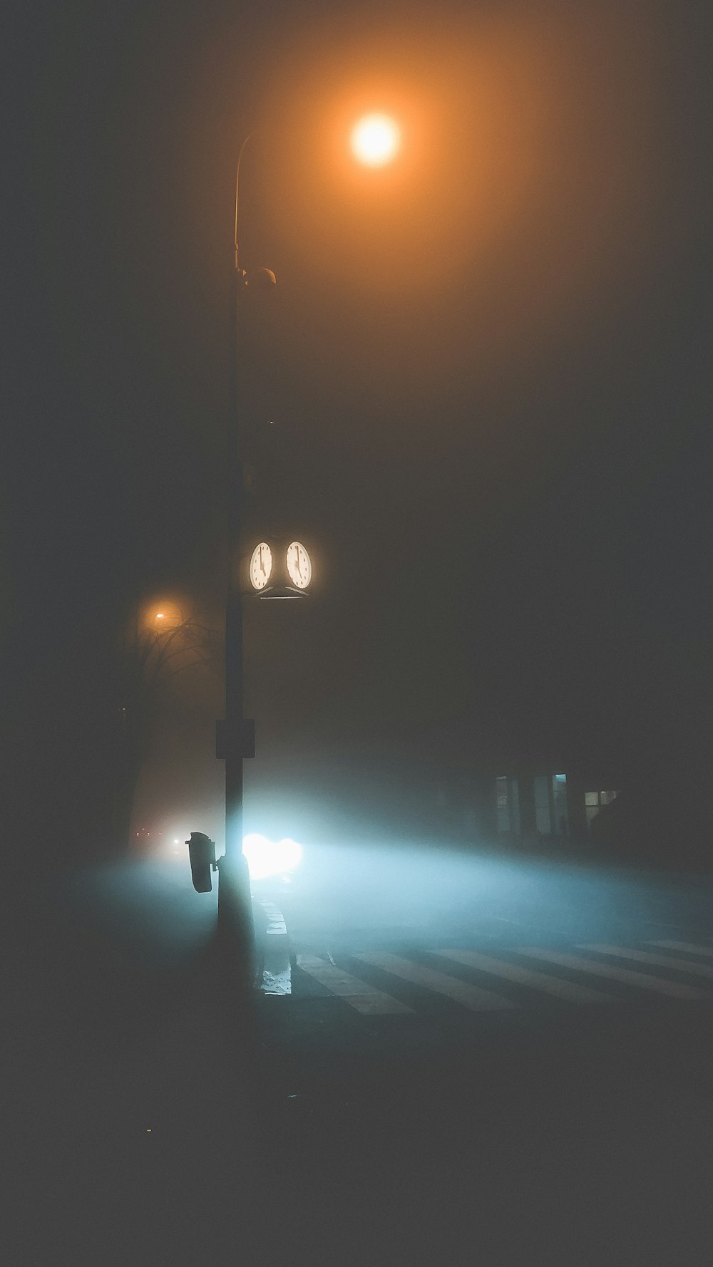 black street light turned on during night time