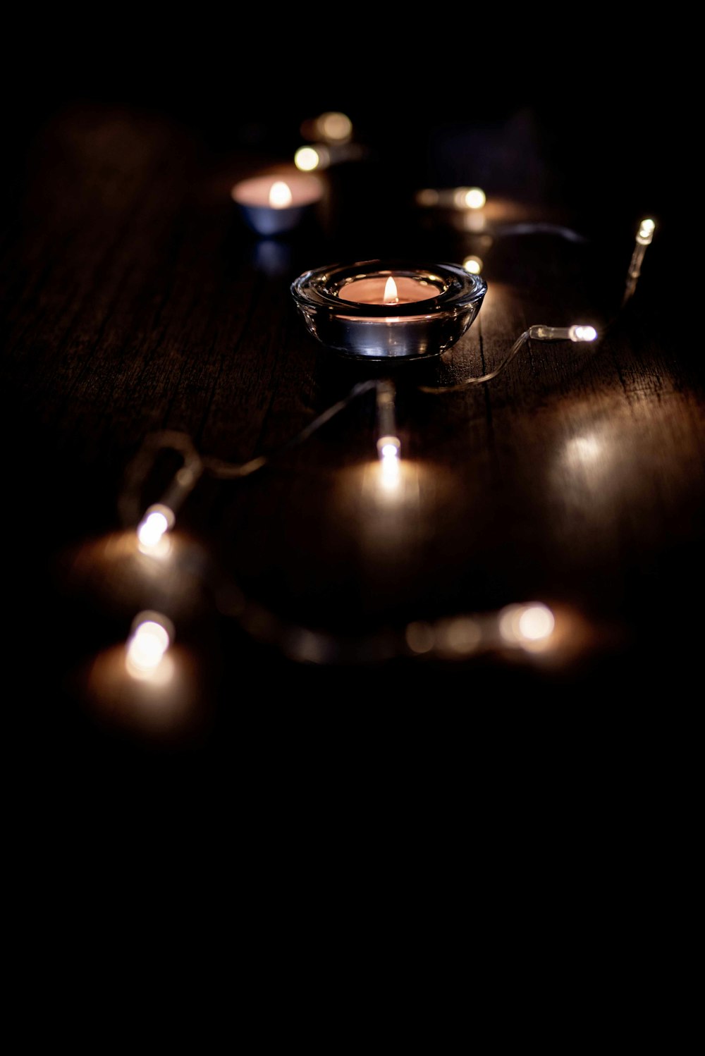 silver ring on brown wooden table