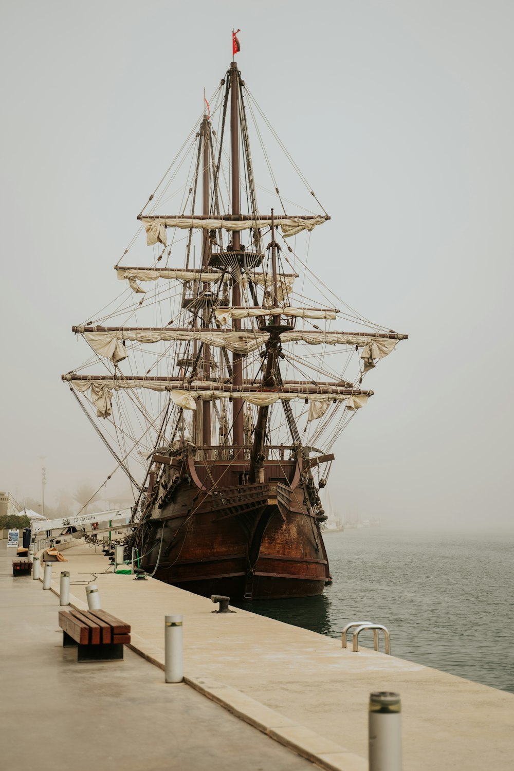 brown ship on sea during daytime