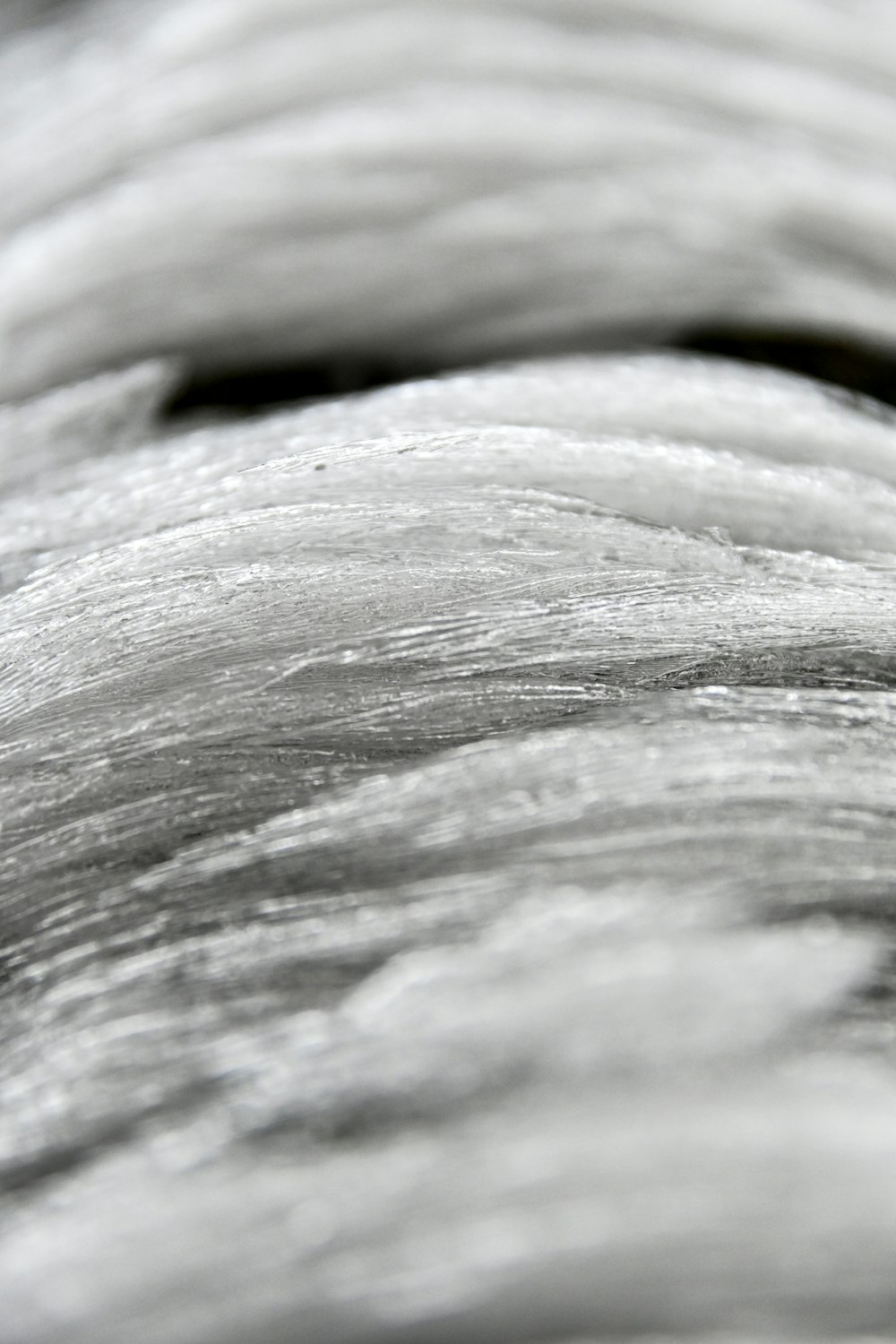 white and gray textile in close up photography