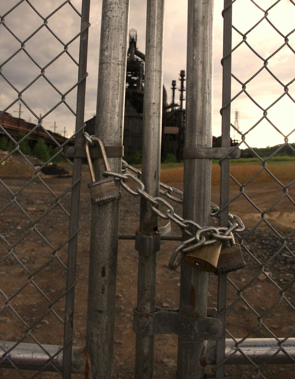 padlock on chain link fence