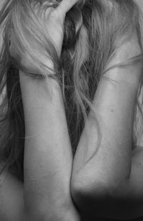 grayscale photo of womans breast