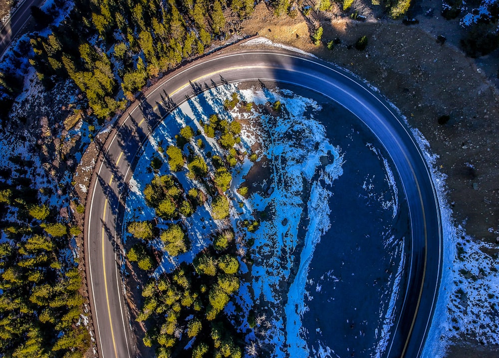 blue and white water on gray concrete road