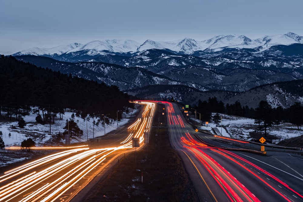 time lapse photography of cars on road during daytime