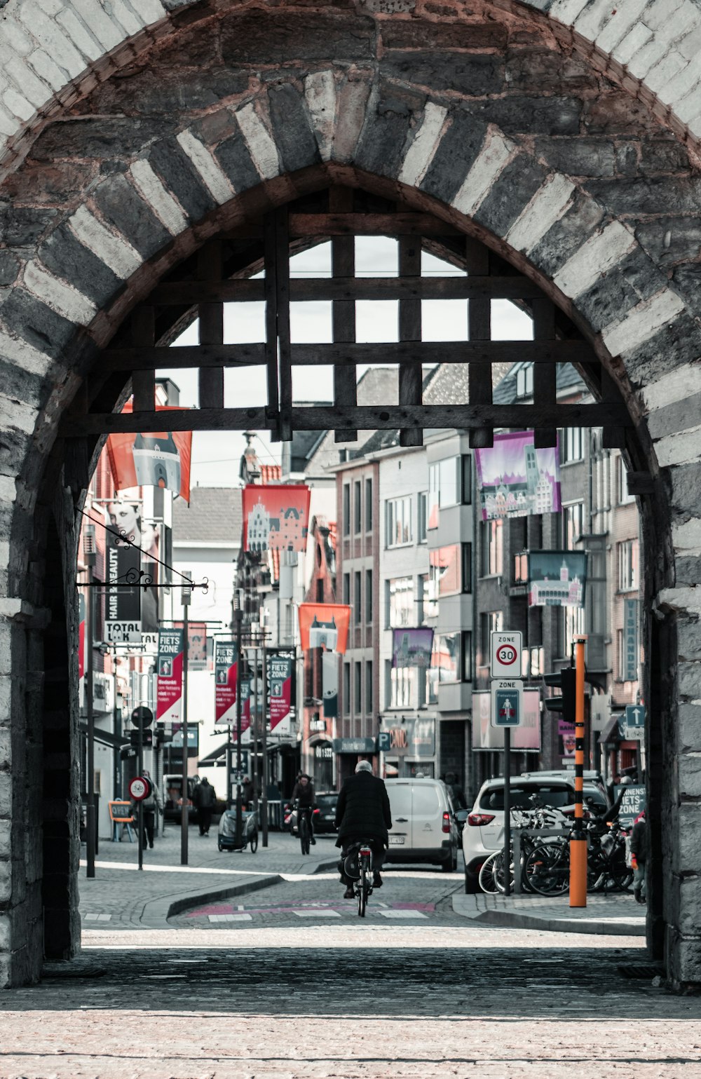 people walking on sidewalk during daytime