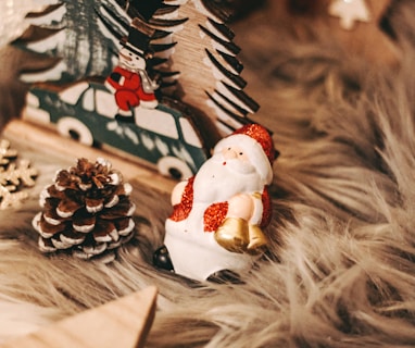 white and red ceramic snowman figurine