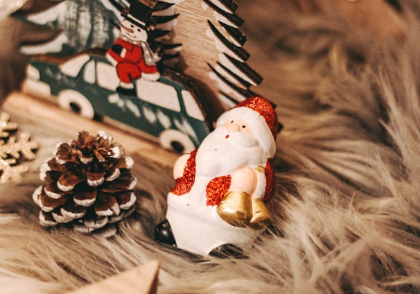 white and red ceramic snowman figurine