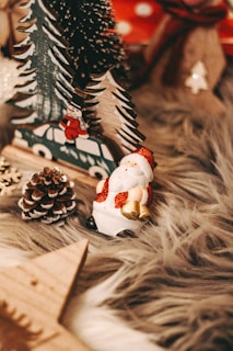 white and red ceramic snowman figurine