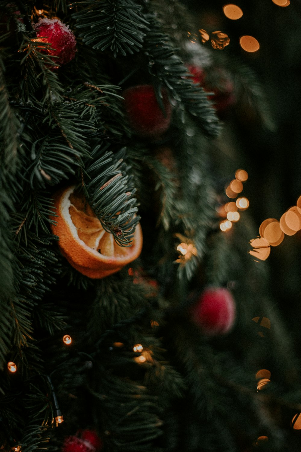 green christmas tree with orange baubles