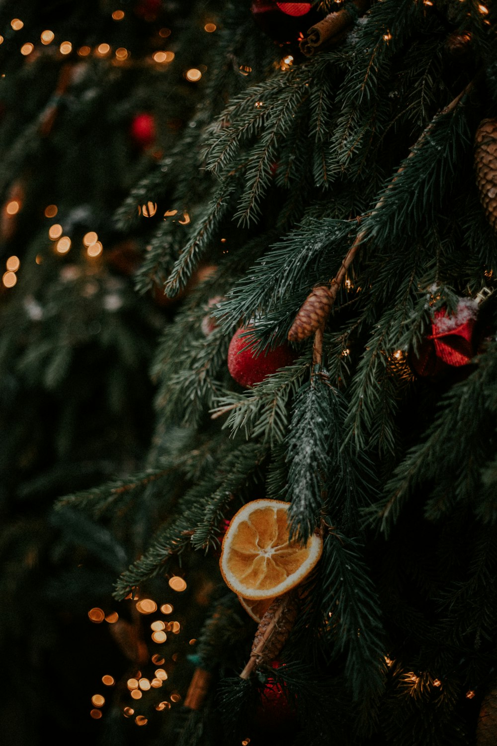 green christmas tree with gold baubles