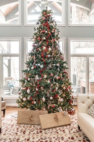 green christmas tree with red and white baubles