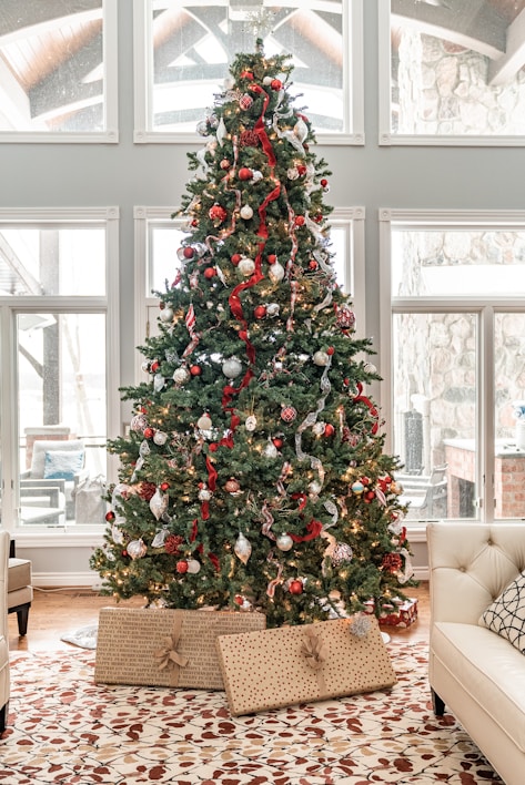 green christmas tree with red and white baubles