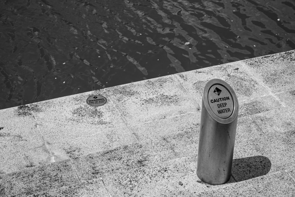 grayscale photo of no smoking sign