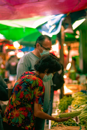 A colorful market scene in Darjeeling with locals selling fresh produce and handmade crafts.