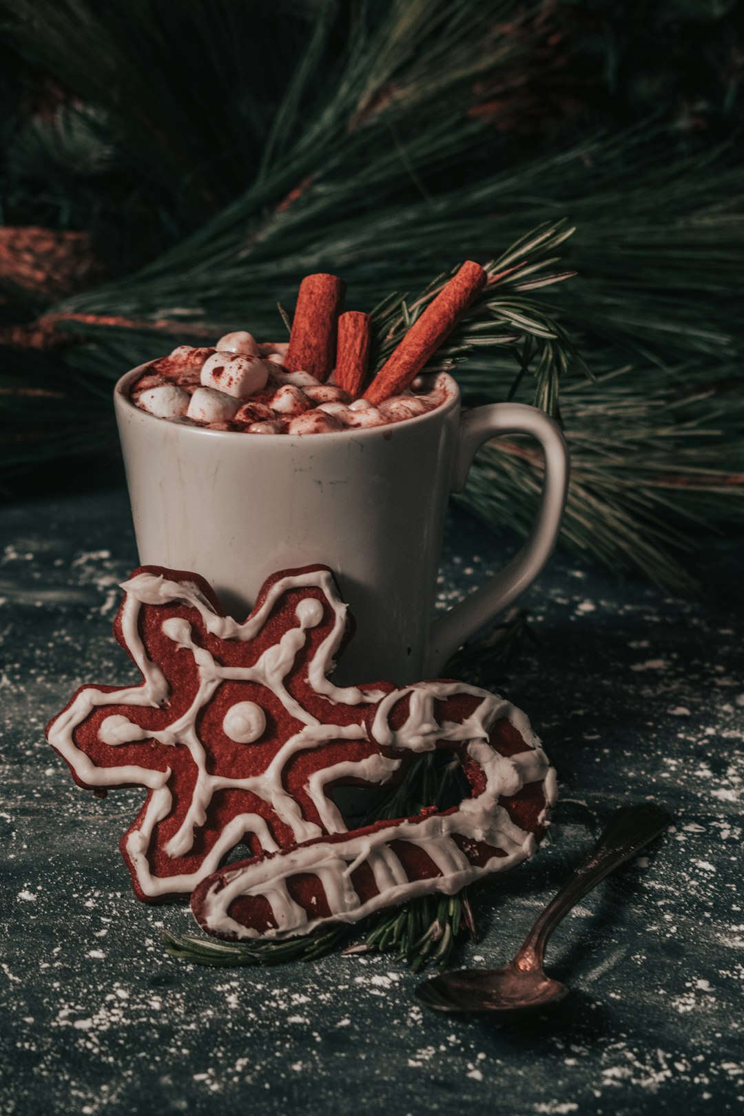 white ceramic mug with red and white candy sprinkles