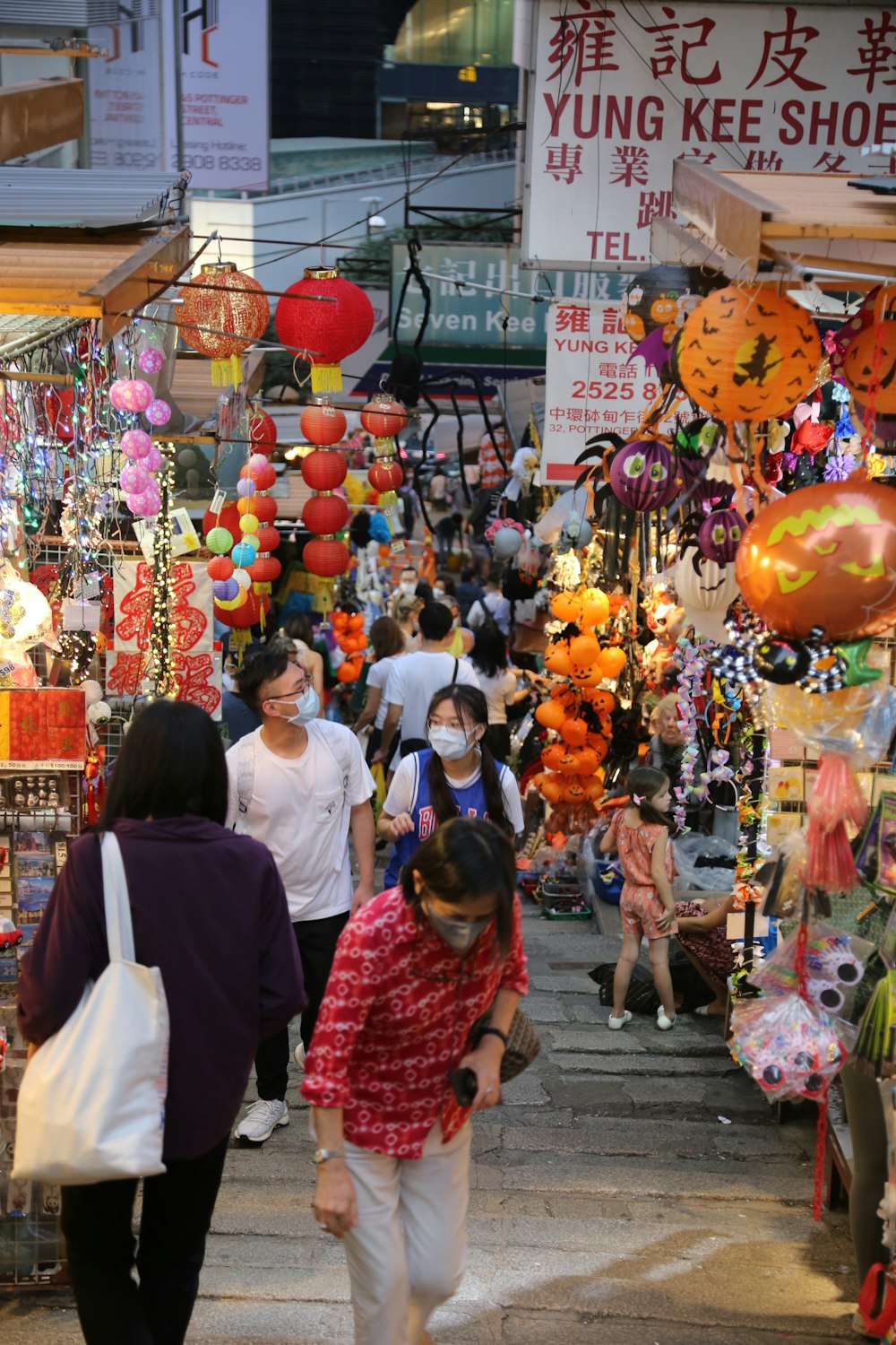 people walking on market during daytime