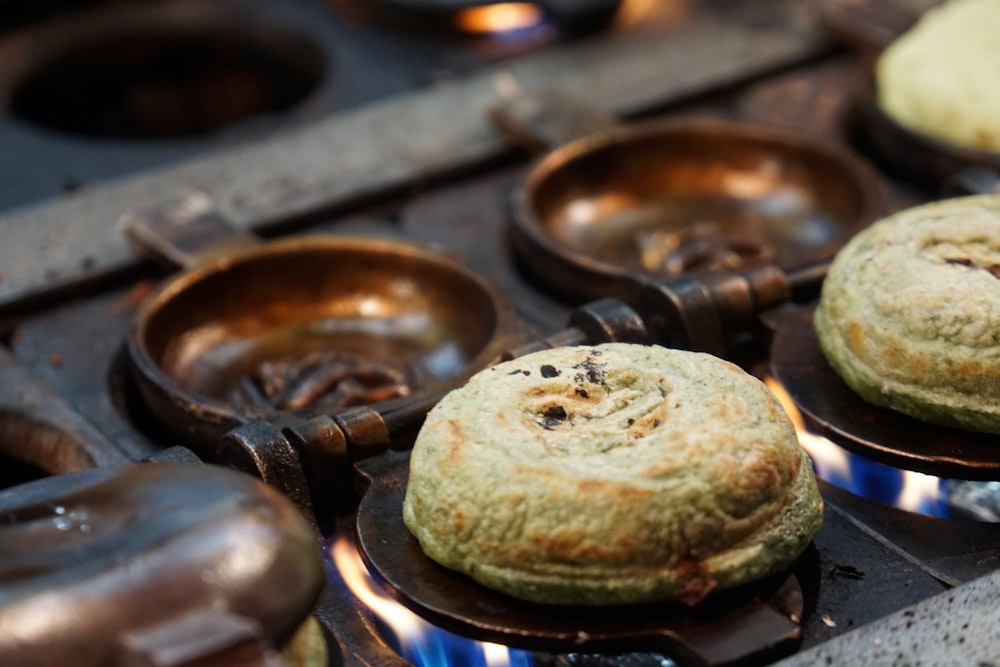 brown pastry on black gas stove