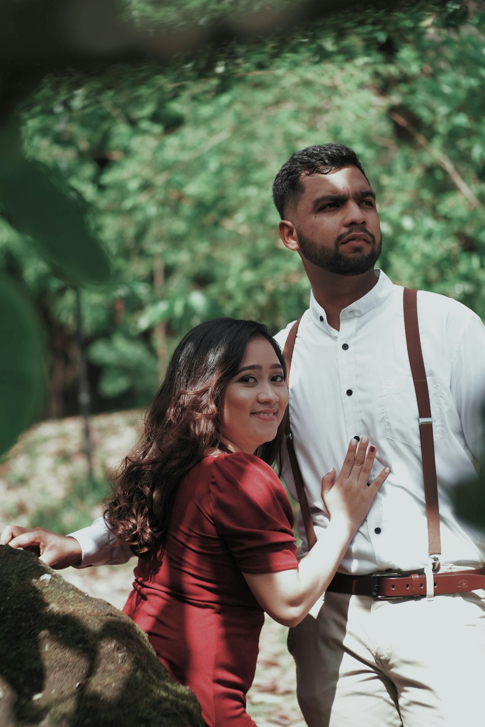 a man and a woman standing next to each other