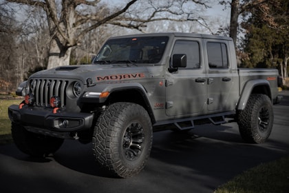 gray jeep wrangler on road during daytime