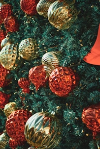 Colorful Christmas ornaments and garlands displayed in a cheerful arrangement.