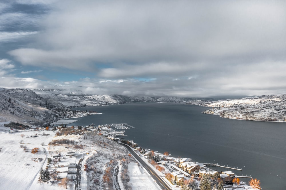 aerial view of city near body of water during daytime