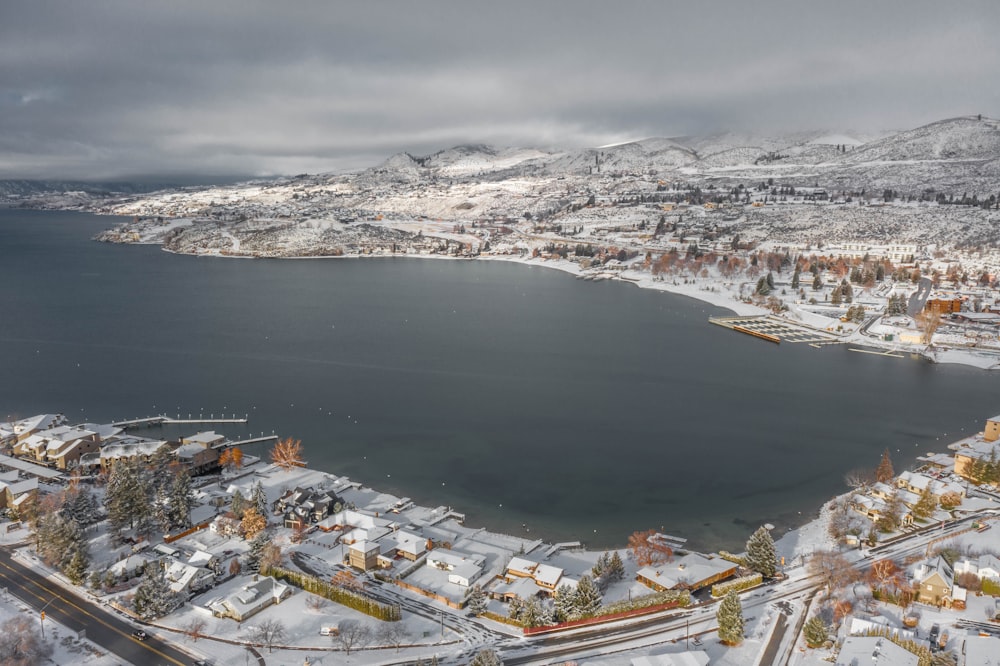 aerial view of city near body of water during daytime