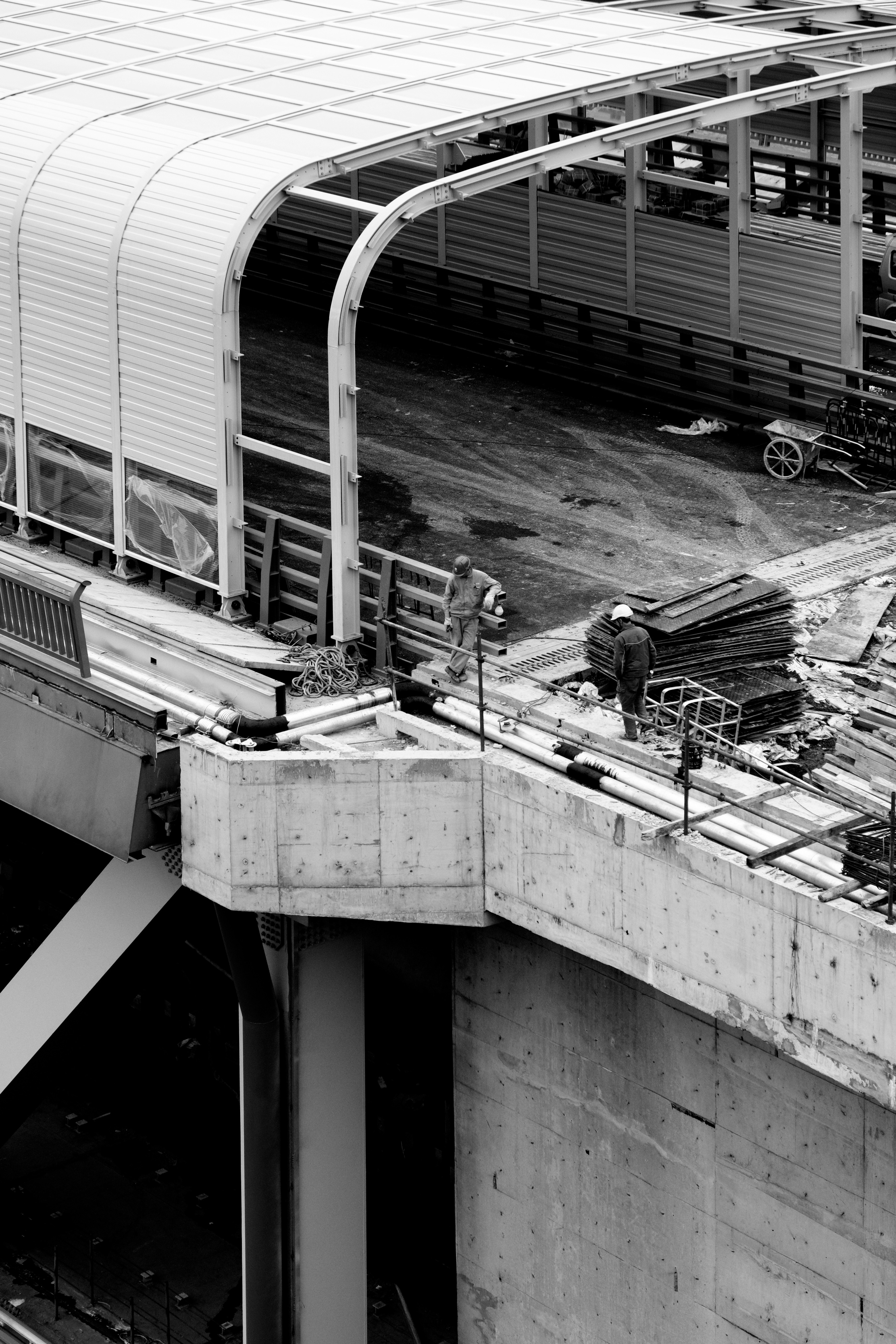 grayscale photo of a train station