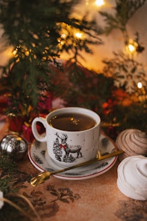 white ceramic mug on white ceramic saucer