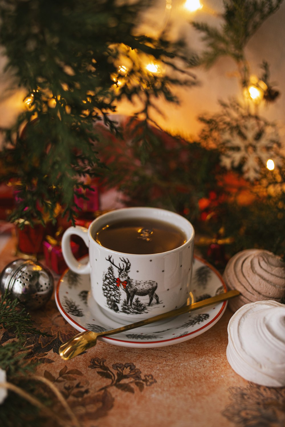 white ceramic mug on white ceramic saucer