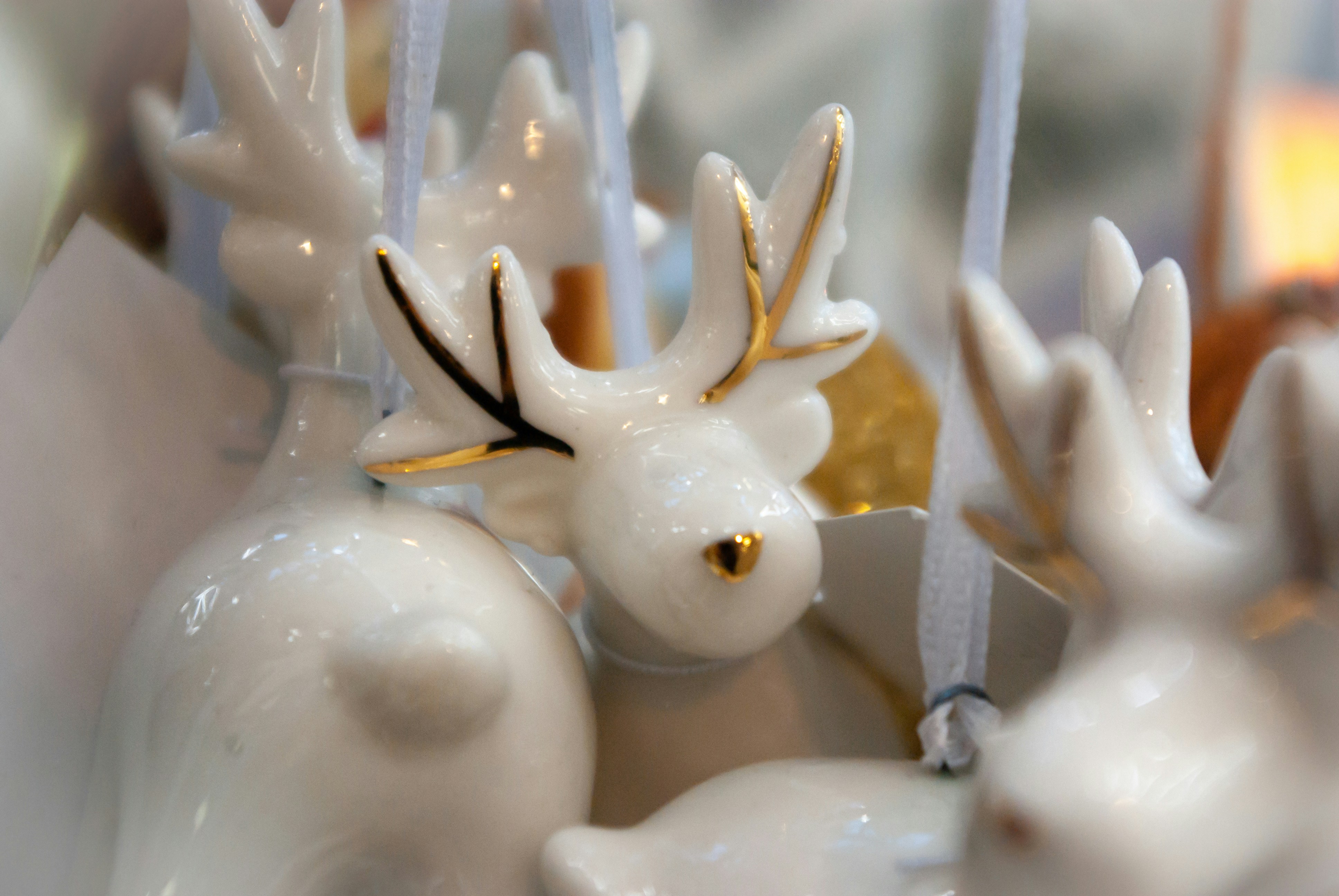 white and yellow bird figurine