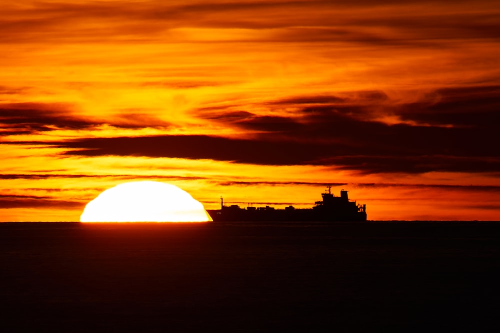 silhouette of building during sunset