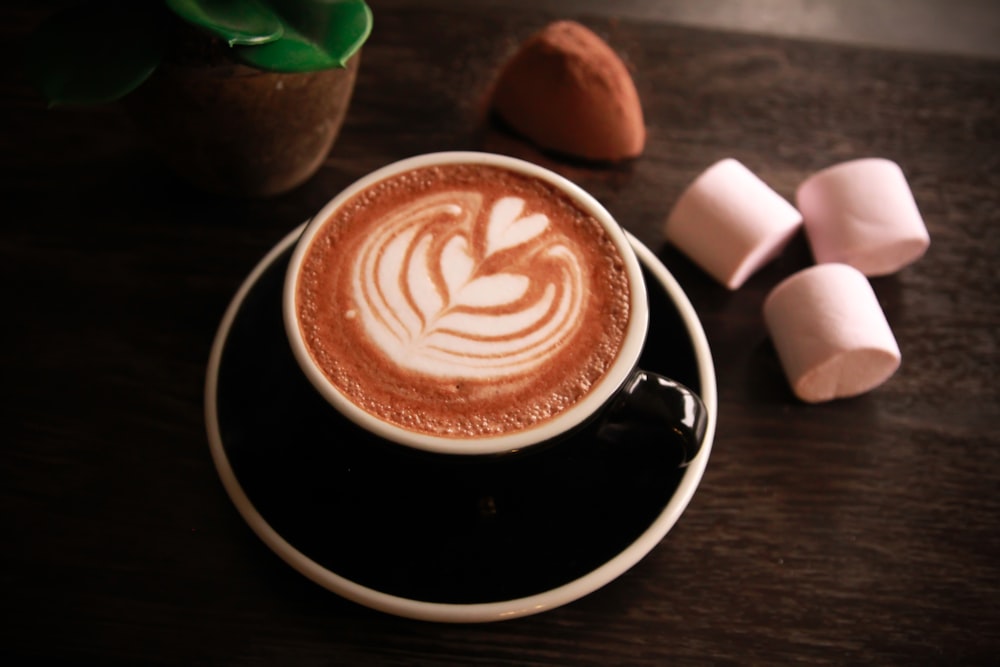 black ceramic mug with coffee