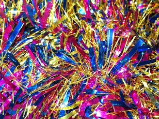 A vibrant display of colorful hair tinsel strands arranged beautifully.