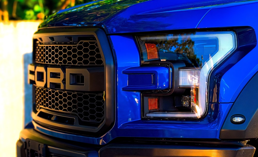 blue car with white and black ceramic mug