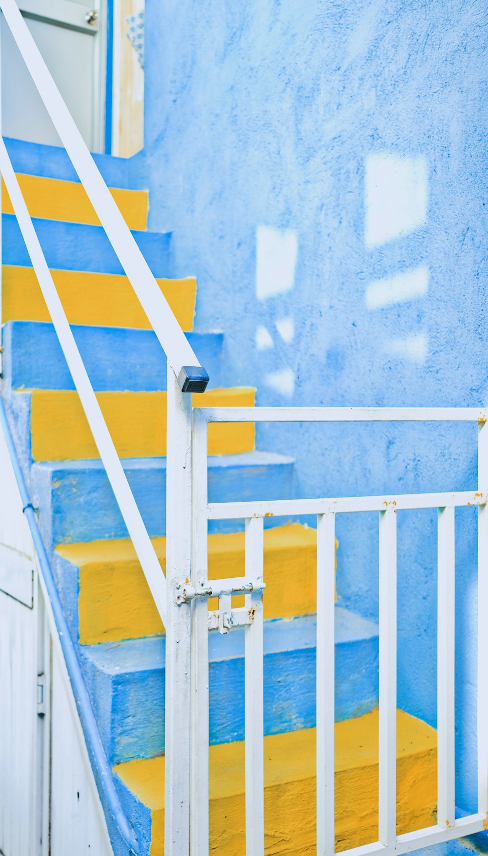 blue and white concrete staircase